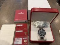 OMEGA box papers.JPEG